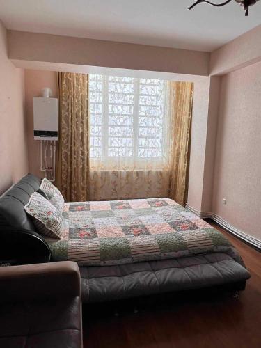 cozy apartment in Bakuriani 객실 침대