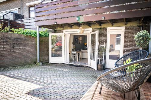 A patio or other outdoor area at Hello Noordwijk - Souterrain Hoogwakersbosstraat 6