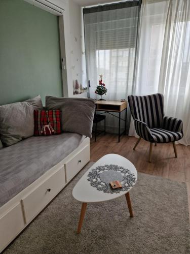 a living room with a couch and a table at NEW - Frendly Luxury Apartment Franka Zagreb in Zagreb