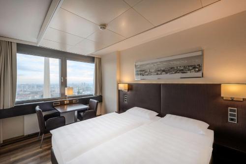 Krevet ili kreveti u jedinici u objektu Park Inn by Radisson Berlin Alexanderplatz