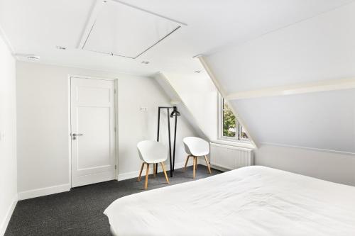 Säng eller sängar i ett rum på Zeayou Zeeland - Appartementen Markt 5 & 5a