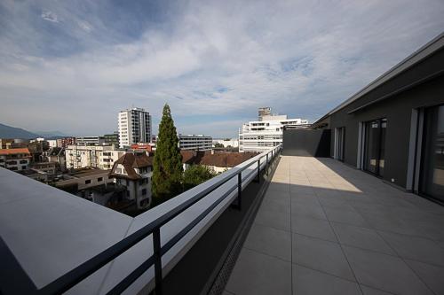 En balkon eller terrasse på The City Zug Apartments