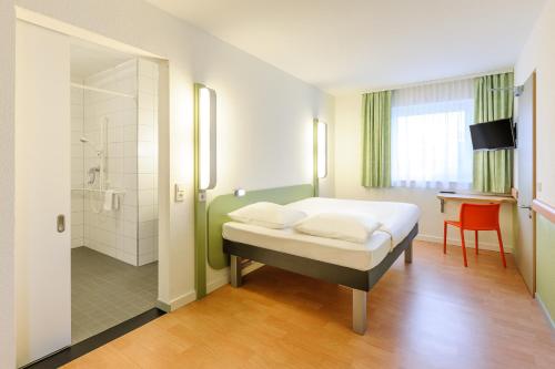 Kama o mga kama sa kuwarto sa Ibis Budget Bamberg