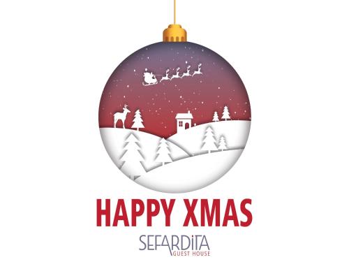 una imagen de un baile de Navidad con un alegre texto de Navidad en Sefardita - Guest House, en Castelo de Vide