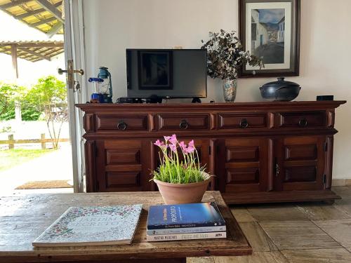 Una televisión o centro de entretenimiento en CASA NO PERÓ - CABO FRIO