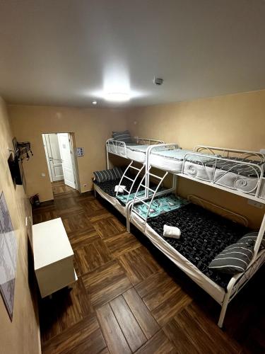 A bed or beds in a room at Hostel 5 Capsule rooms and appartment