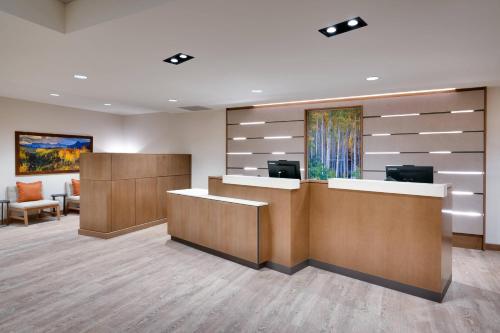 an office with a reception desk and a waiting room at Fairfield Inn & Suites by Marriott Denver West/Federal Center in Lakewood