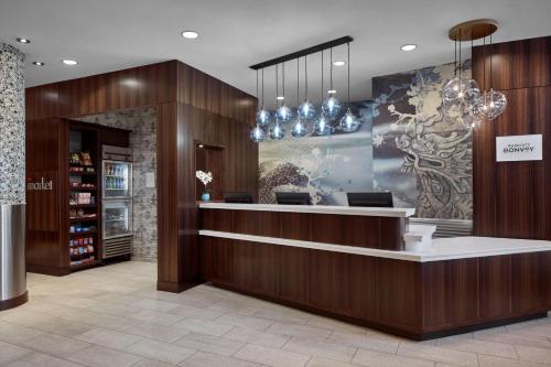 a lobby of a store with a reception desk at Fairfield Inn & Suites by Marriott Washington Downtown in Washington