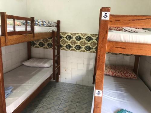 Giường trong phòng chung tại Seu Borba Pousada & Hostel