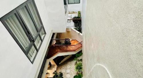 an overhead view of a balcony in a building at HẢI AN HOTEL in Bao Loc