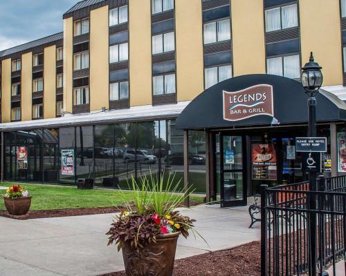 a restaurant with an awning in front of a building at Quality Hotel & Suites At The Falls in Niagara Falls