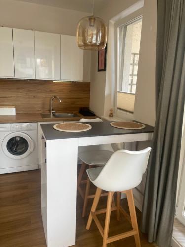 Η κουζίνα ή μικρή κουζίνα στο Apartament Calineczka