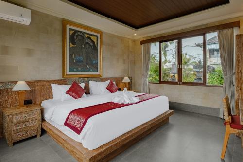 Monique Ubud Villa में एक कमरे में एक या कई बेड