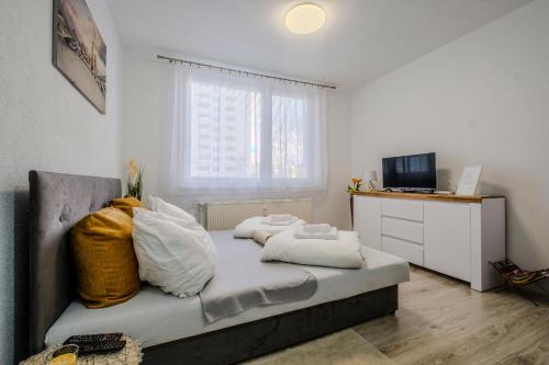 En tv och/eller ett underhållningssystem på Apartman Sweet home