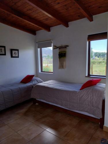 Una cama o camas en una habitación de Entre Montañas