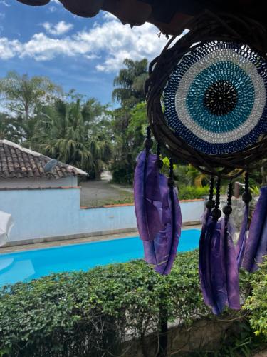 The swimming pool at or close to Villa Tiê Paraty