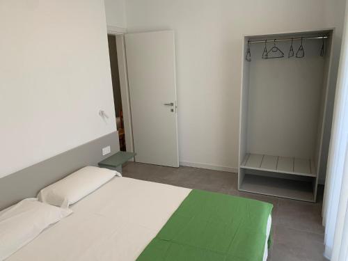 Posteľ alebo postele v izbe v ubytovaní Matilde Apartments Caorle