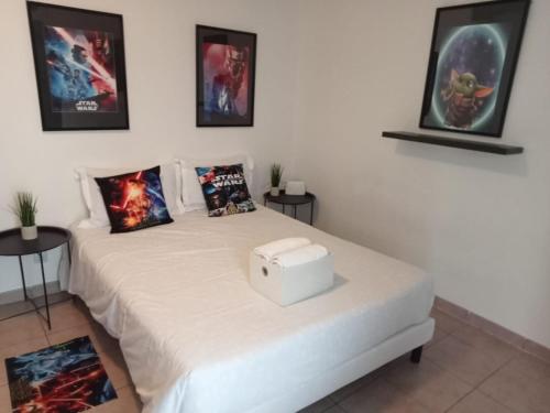 Giường trong phòng chung tại C301 Appartement Proche DisneyLand Paris