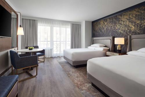 A bed or beds in a room at Grand Hyatt Washington