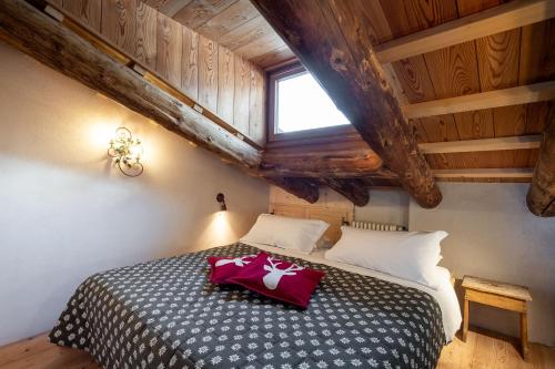 Кровать или кровати в номере CORTINA Lodge