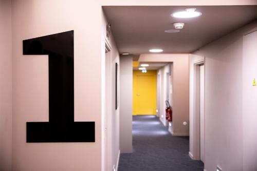 a hallway with a number one on the wall at The People - Tours in Tours