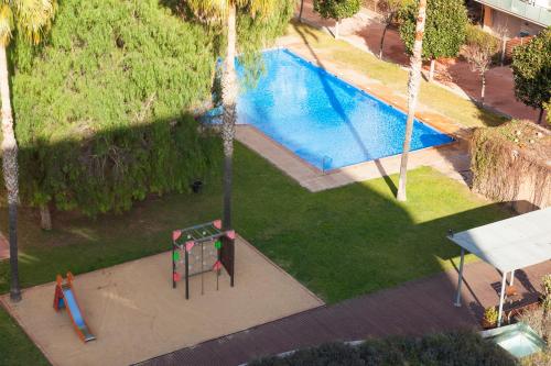 Poolen vid eller i närheten av Enjoybcn Marina Apartment