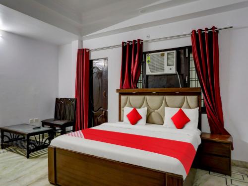 OYO 81115 Hotel Shyama Inn में एक कमरे में एक या कई बेड