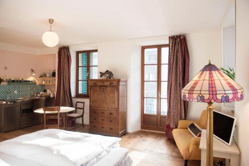 Katil atau katil-katil dalam bilik di Boutique-Hotel Guesthouse Le Locle