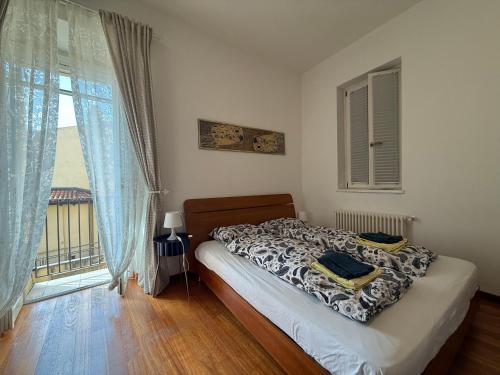 מיטה או מיטות בחדר ב-Trionfo your home in Trieste business and holiday stays