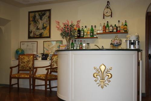 The lounge or bar area at Hotel Bodoni