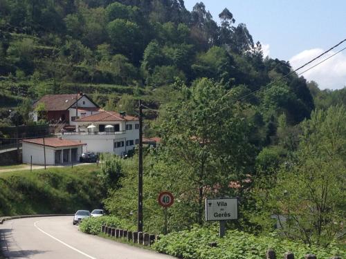 a street sign on the side of a road at Casa Lola Principe in Geres