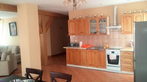 Nhà bếp/bếp nhỏ tại Apartament Mikołajki