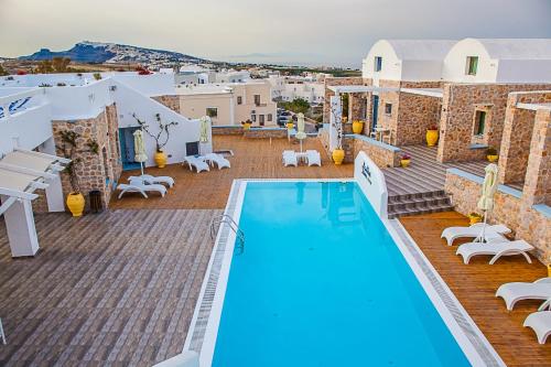 a view of the pool at a hotel in santorini at Nautilus Dome in Fira