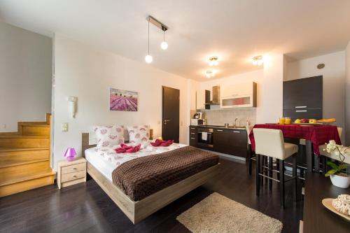 Budapest Center Residence में एक कमरे में एक या कई बेड