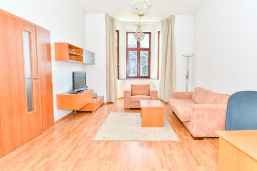 Svetainės erdvė apgyvendinimo įstaigoje Apartment Downtown