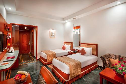 Vuode tai vuoteita majoituspaikassa Regency Madurai by GRT Hotels