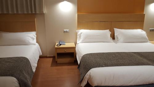 A bed or beds in a room at Espel