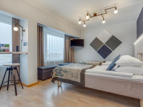 Кровать или кровати в номере Original Sokos Hotel Vaakuna Vaasa