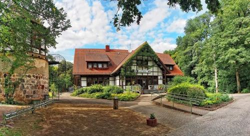 Vrt pred nastanitvijo Neue Mühle Kleines Landhotel