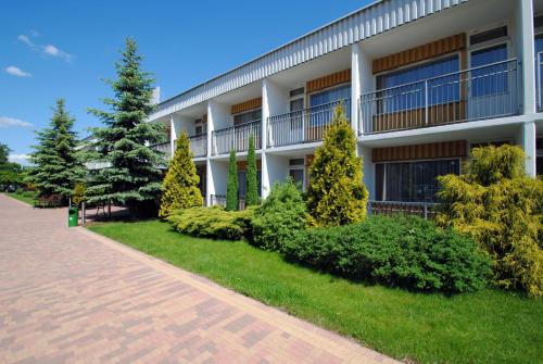 Um jardim em Obiekt Hotelarski Patron