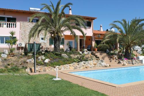 The swimming pool at or close to Villa Lucy