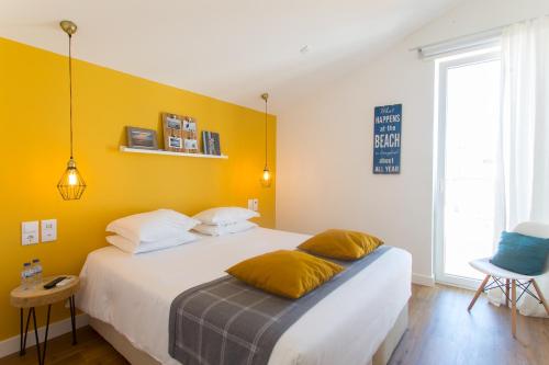 Krevet ili kreveti u jedinici u okviru objekta Aveiro Rossio Bed & Breakfast