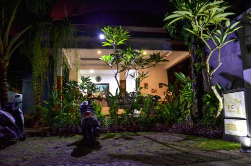 Sodas prie apgyvendinimo įstaigos Palm Garden Bali