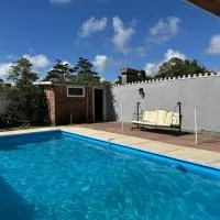 Casa con piscina Atlántida, מלון באלטנטידה