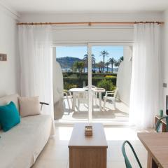 Apartamento a pie de playa, climatizado y parking