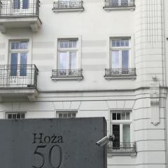 Apartment Hoża 50 with a balcony in close Center