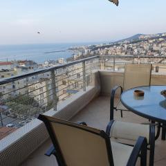 Christos house-- Comfortable apartment with great view and private parking !