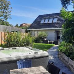 Holiday Home de witte raaf with garden and hottub