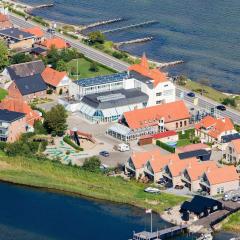 6 person holiday home on a holiday park in Hejls