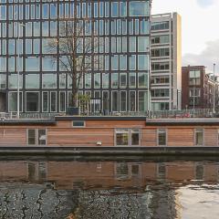 HouseBoat next to AMSTEL